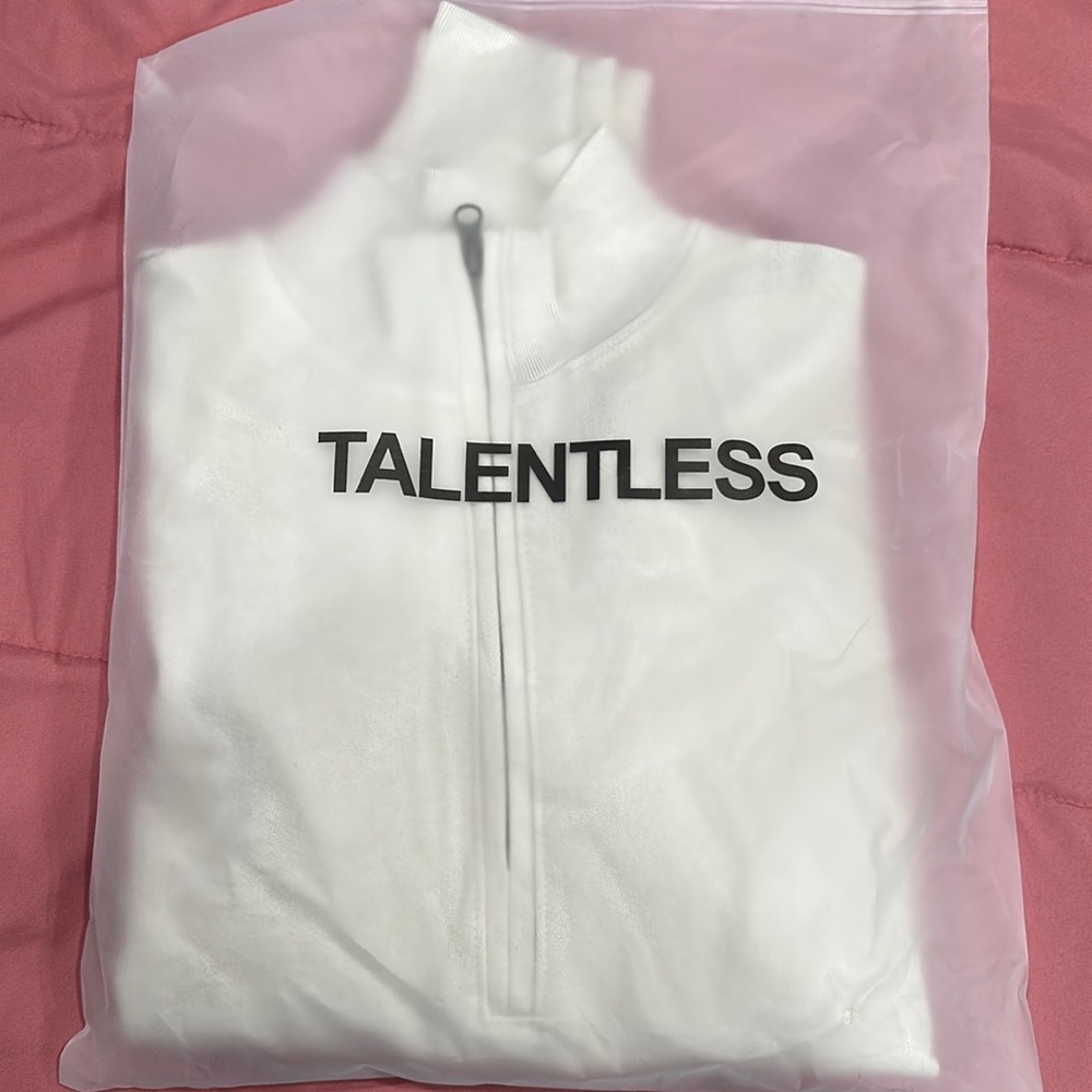 Woman’s 3/4 zip pullover from talentless